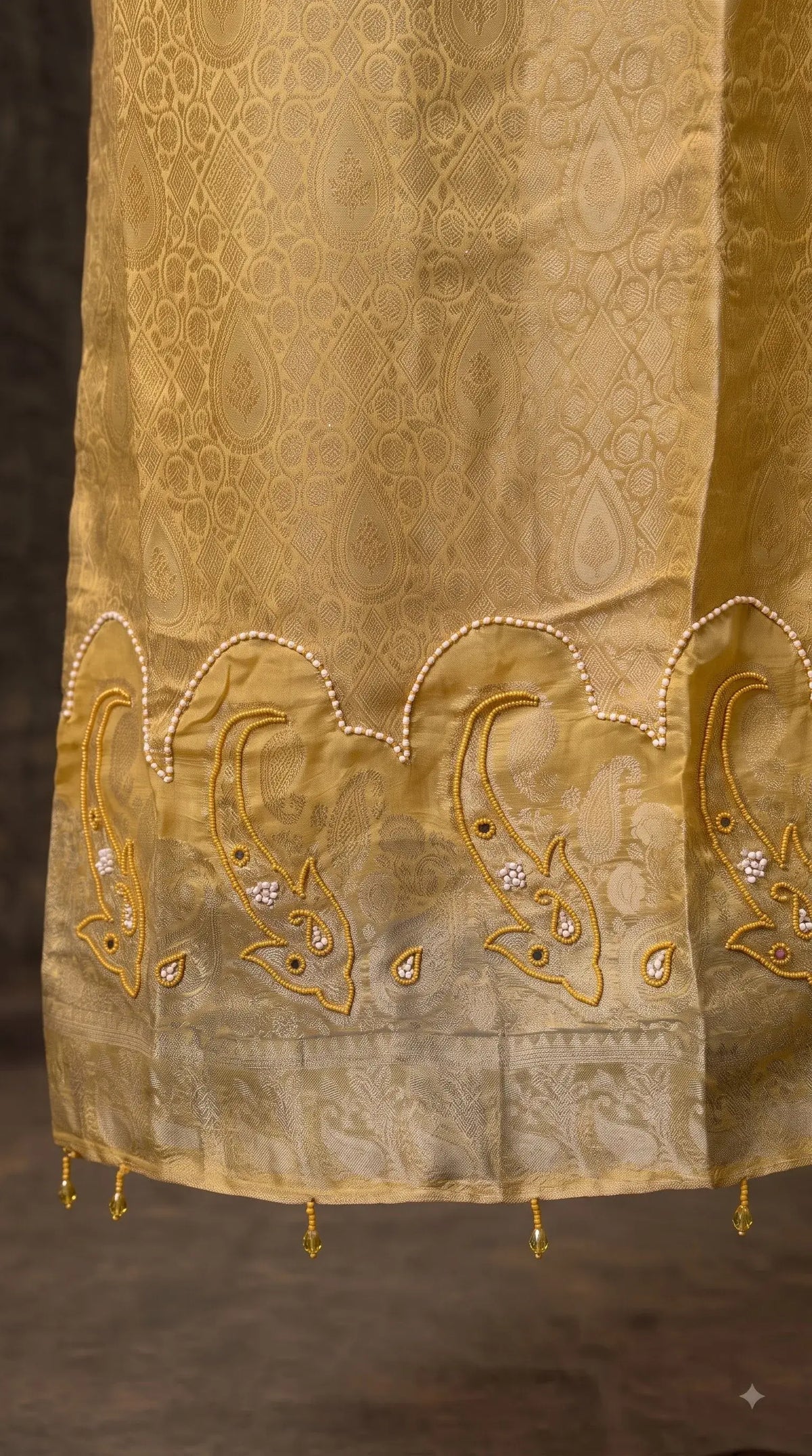Pakistani Designer Yellow Shade Soft Tissue Suit with Bead & Paisley