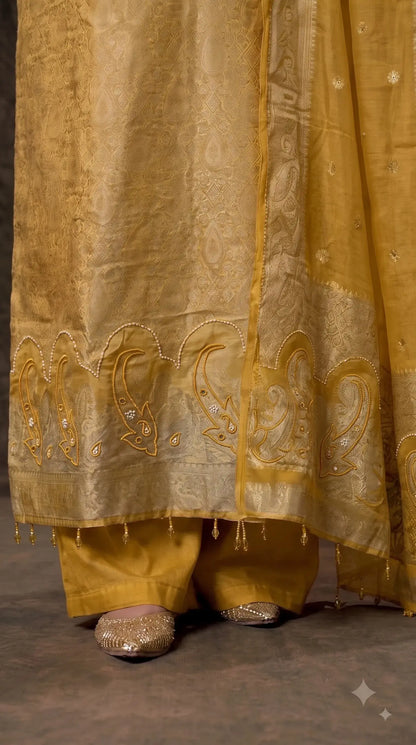 Pakistani Designer Yellow Shade Soft Tissue Suit with Bead & Paisley