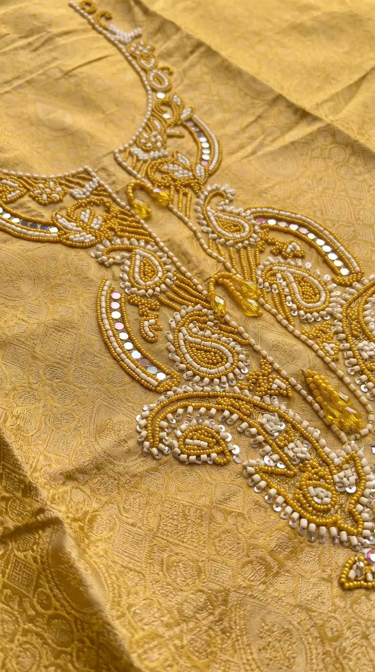 Pakistani Designer Yellow Shade Soft Tissue Suit with Bead & Paisley
